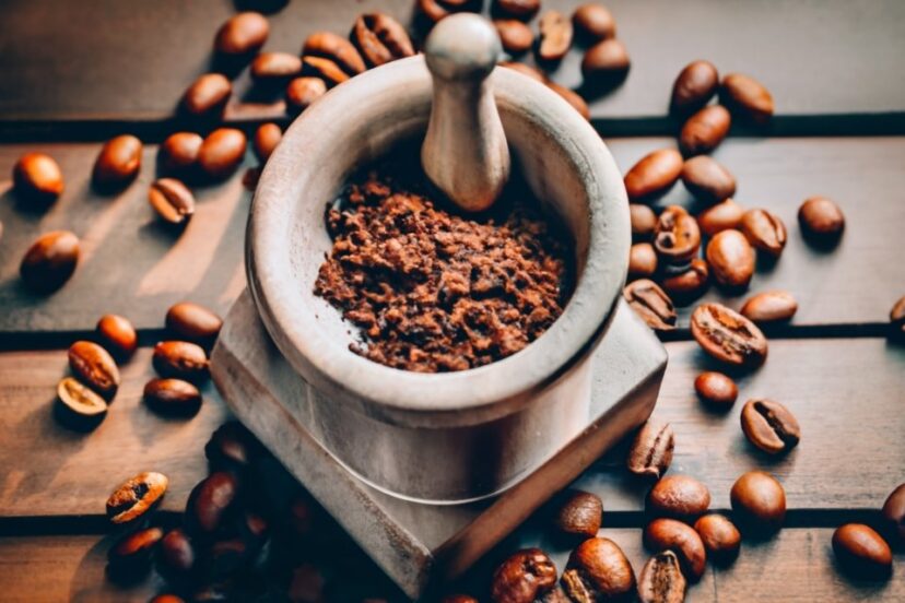 grinding coffee with a mortar and pestle
