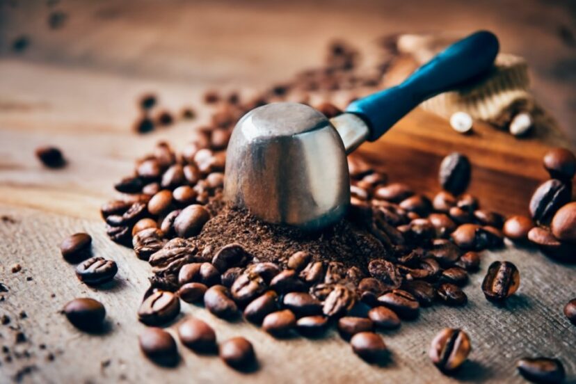 crushing coffee with a hammer
